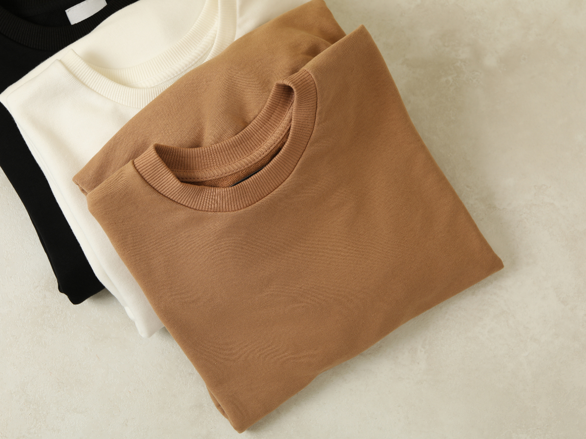 How to Choose Between Fleece vs French Terry Wholesale Sweatshirts for Your Clothing Line